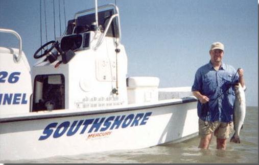 Captain Mike's 26' Southshore Bay Skiff is powered by a Mercury 225 hp OptiMax 