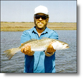 Capt. Tom with a nice Speckled Trout