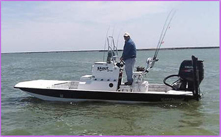 Captain Tony David with his new Dargel shallow water boat with a 140 H.P. Suzuki Outboard
